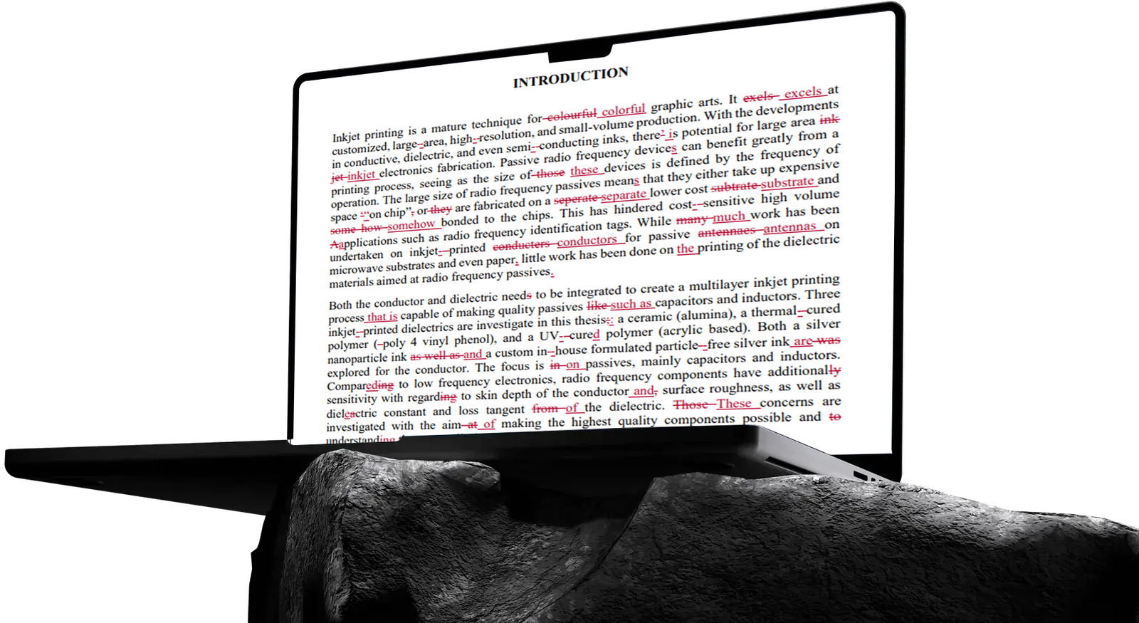 Book manuscript being edited on a laptop screen